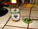 photo of a bottle of rice vinegar sitting on kitchen shelf